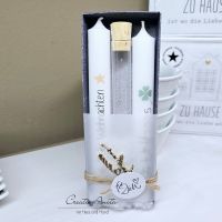 Wunscherfüller mit Kerzen als Geschenk verpackt